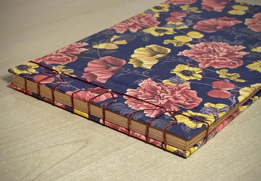 Photo album with Japanese stab binding, decorative cover and Kraft paper pages