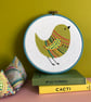 Green Chirpy Bird Hand Embroidered Wall Decoration - Image 1