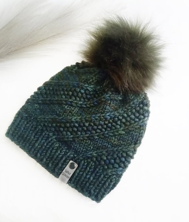 Hand Knit Beanie Hat. Luxury Merino wool in forest green with Faux fur pompom. 