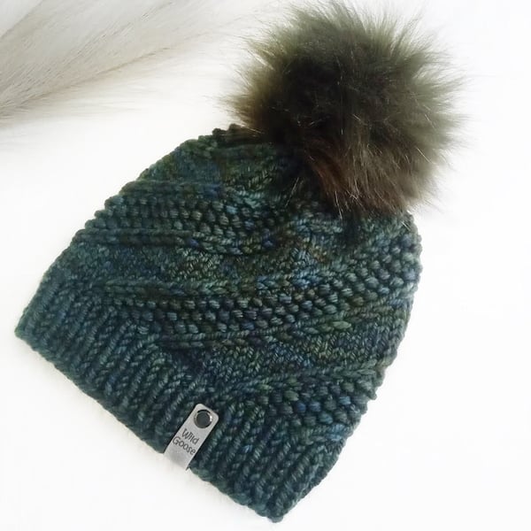 Hand Knit Beanie Hat. Luxury Merino wool in forest green with Faux fur pompom. 