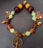 Elasticated beaded red squirrel, tree of life and gold acorn charm bracelet  - Image 3