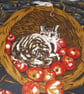 A brown tabby cat in a basket of apples cushion - Image 2