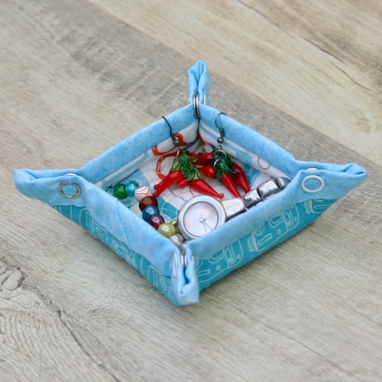 Small Quilted storage box featuring sewing fabric