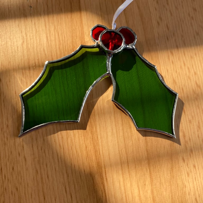 Beautiful stained glass Holly and berries