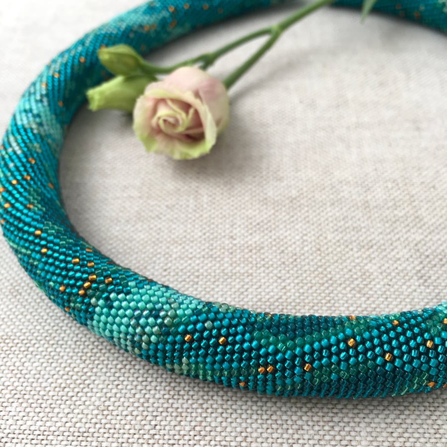 Teal python beaded necklace. Unique design, han... - Folksy