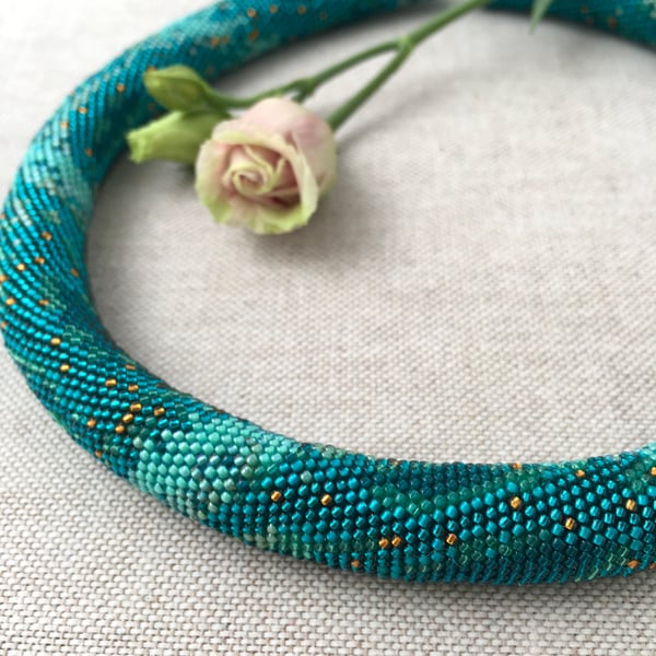 Teal python beaded necklace. Unique design, handmade, snake pattern choker 