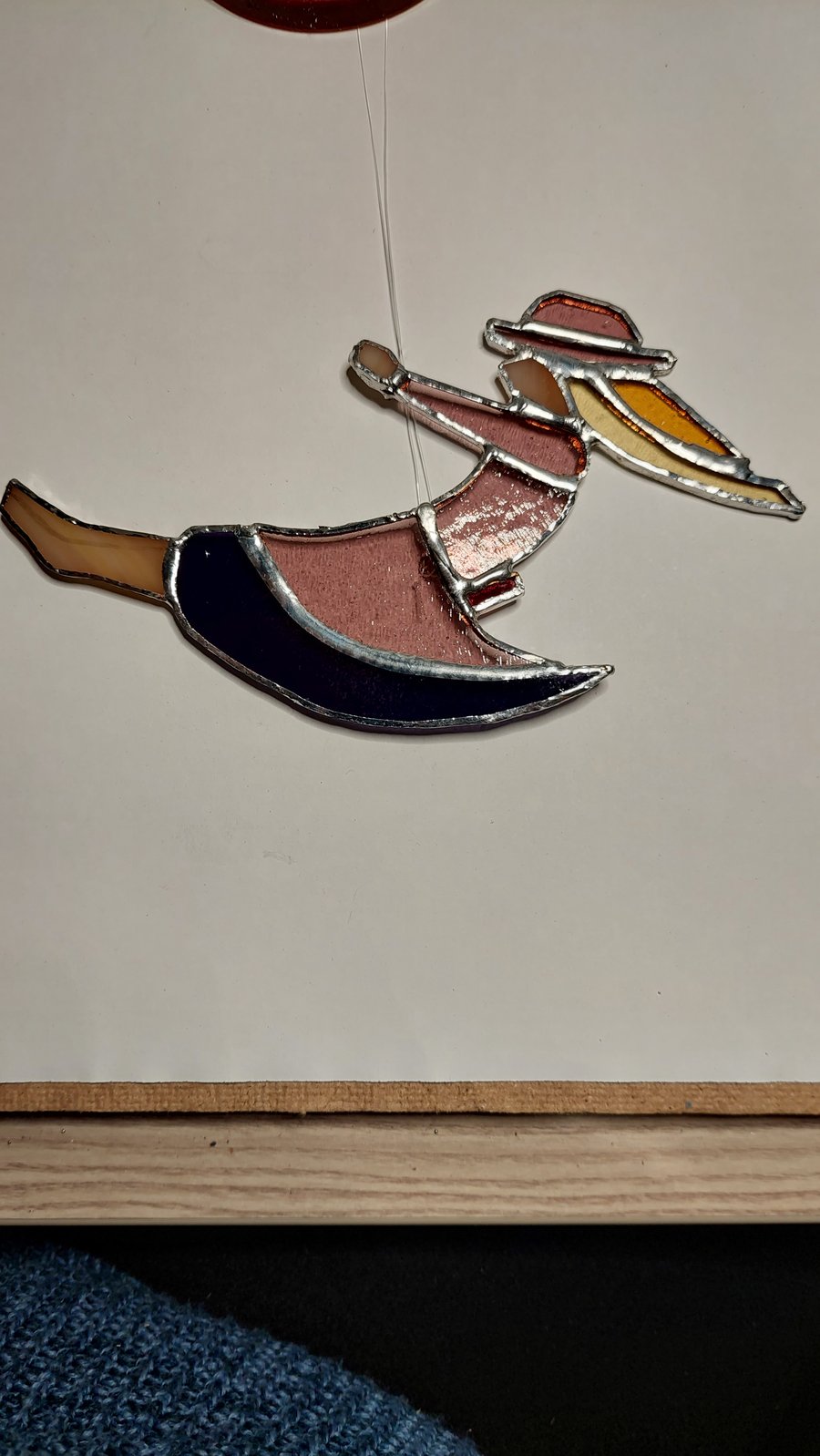 Girl on a swing window hanging