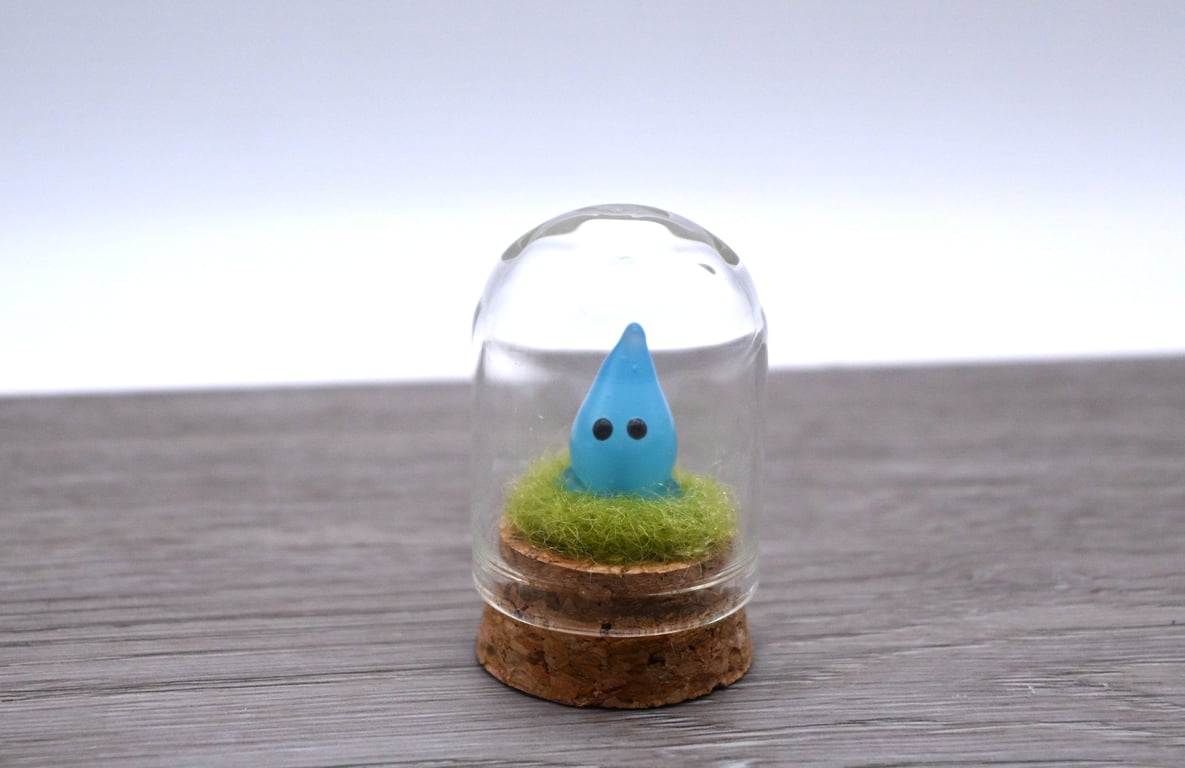 small glass wisp keepsake figure