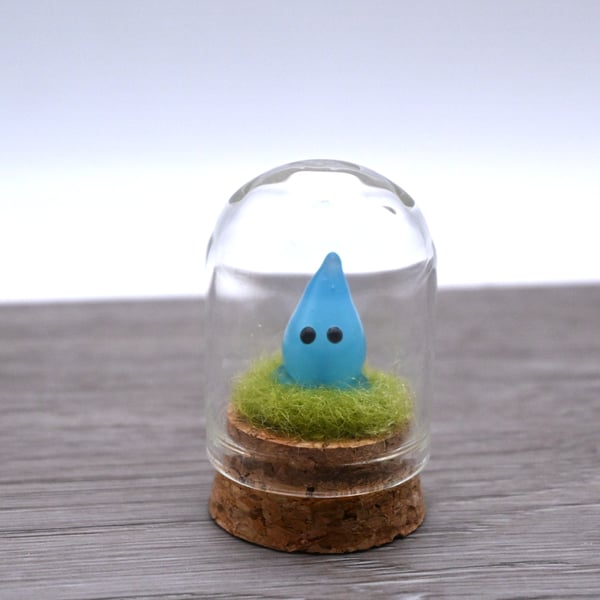 small glass wisp keepsake figure