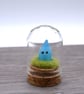 small glass wisp keepsake figure