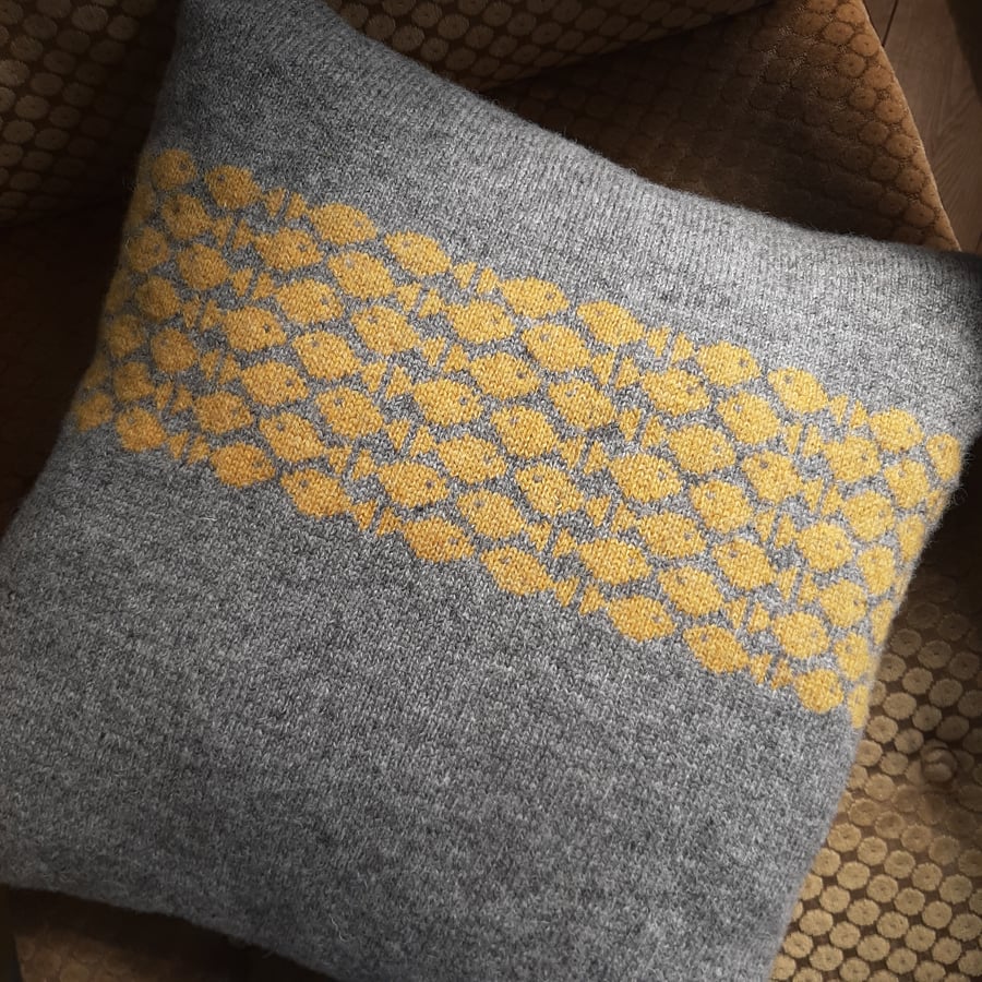 Grey Knitted Cushion with yellow fish detail