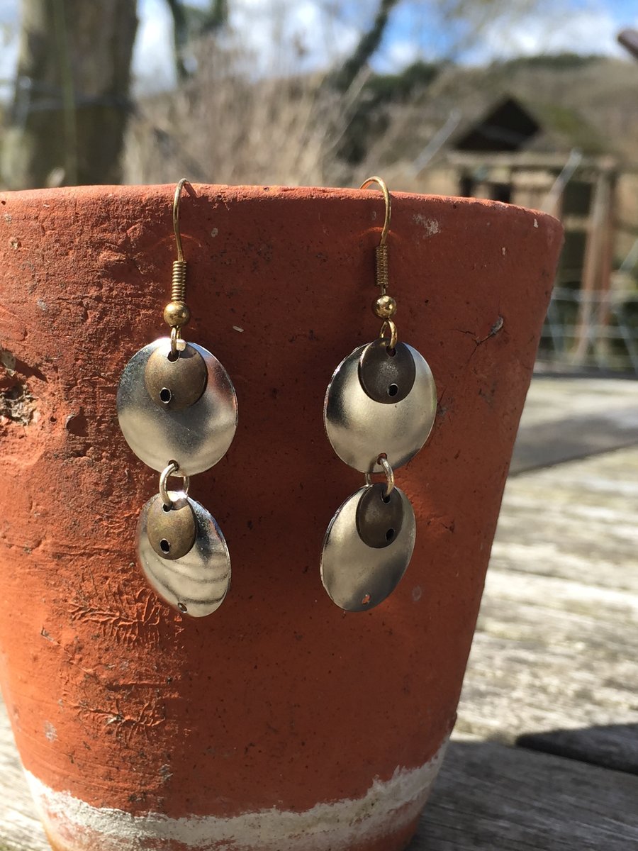 Silver and antique gold metal disc earrings