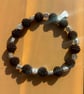 Handmade Black Bobbly Bead Bracelet with Silver-Tone Flower Accents