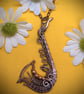 Antique copper wire wrapped Saxophone pendant