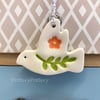 Teeny ceramic dove decoration with leaves and orange flower