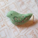 Bird brooch with a short tail and hand-embroidered design