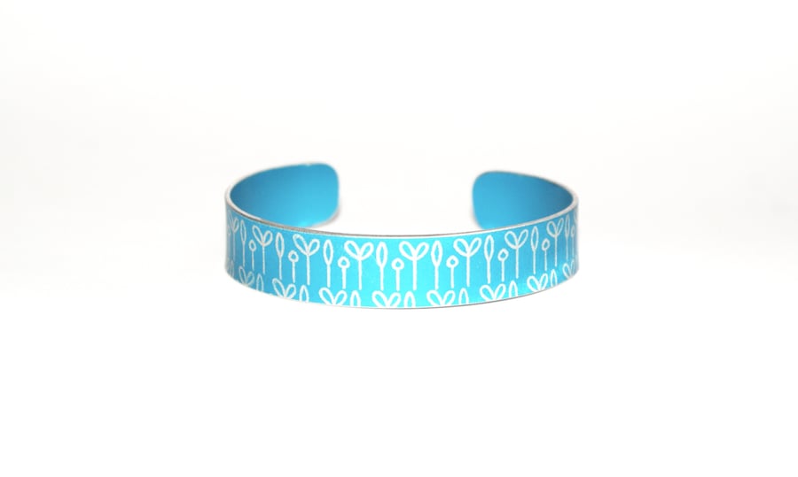 Medium childrens aluminium spring buds print bracelet turquoise