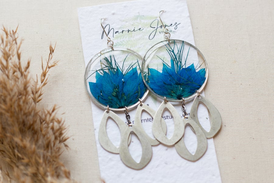 Blue Nigella petal earrings, in clear resin earrings, sterling silver ear wires.