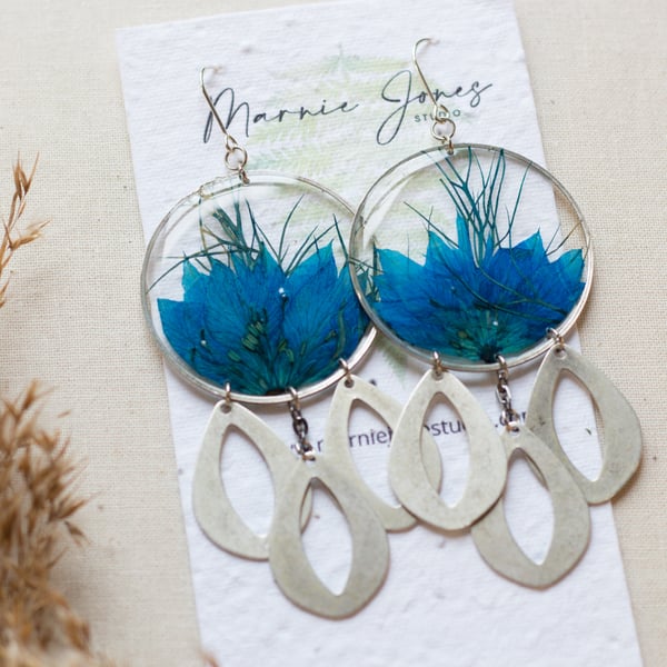 Blue Nigella petal earrings, in clear resin earrings, sterling silver ear wires.