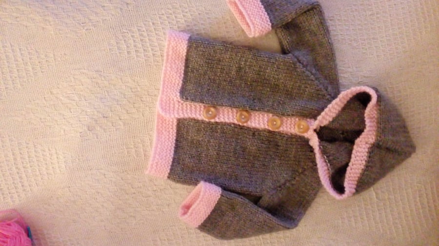 Unisex hand-knitted baby coat