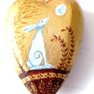 Hare on a chunky golden heart shape  hand painted