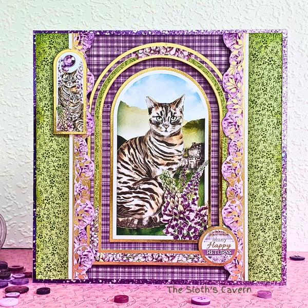 Handmade birthday card with a cat, Many Happy Returns, purple tartan pattern