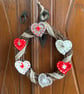 Scandi-style Christmas wreath made from crocheted hearts and ribbon - Image 5