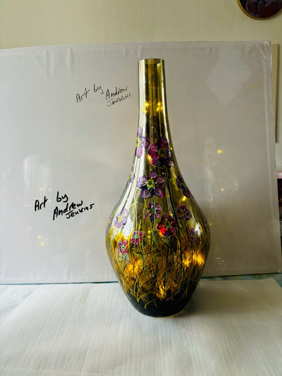 A hand painted and fired glass vase by Andrew Jenkins 