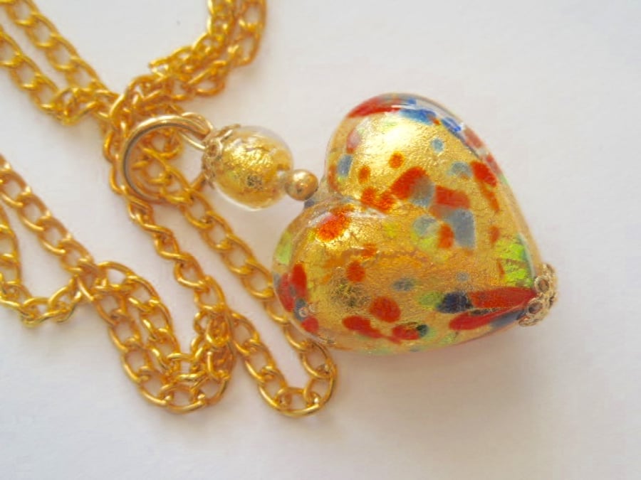 Gold Murano glass  heart pendant.