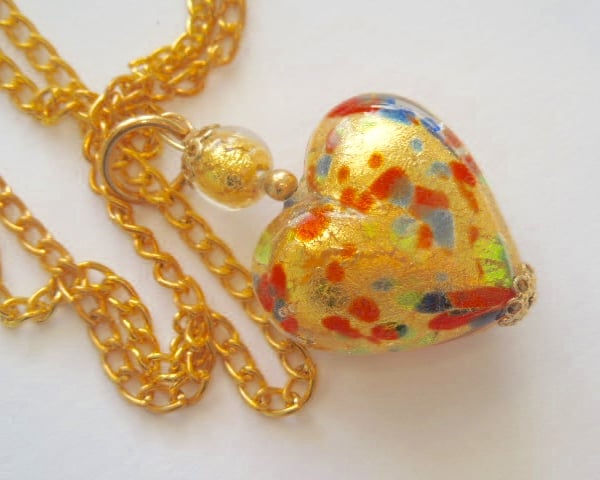 Gold Murano glass  heart pendant.