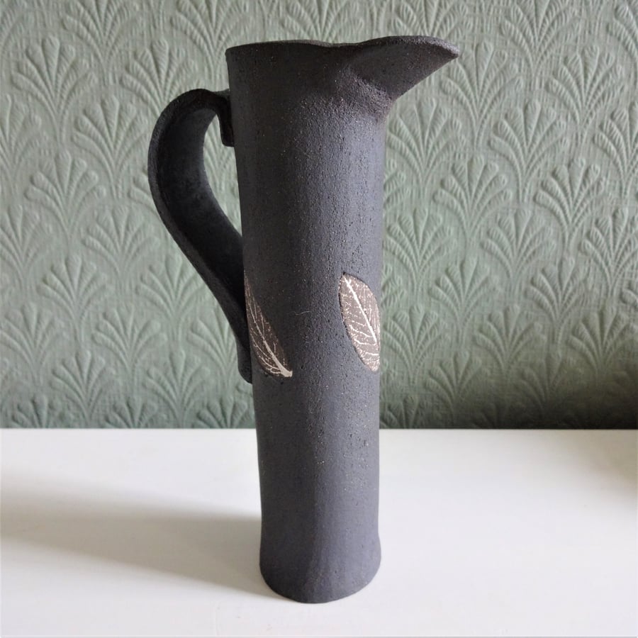 Stella - slim jug with sage leaf motif in black stoneware ceramic