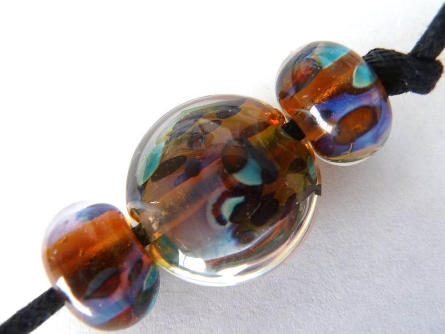 amber flecks, lampwork glass bead