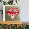 Gold and red heart greetings card