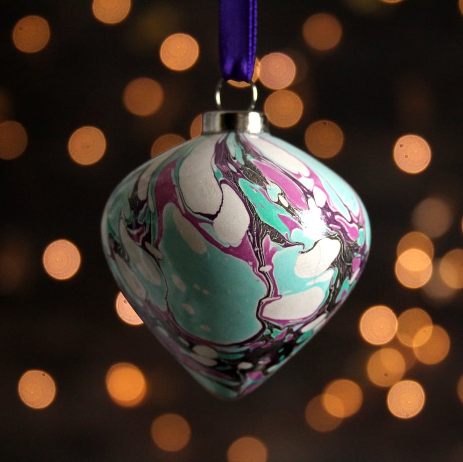 Purple and turquoise hand marbled ceramic Christmas bauble drop shape