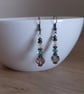 RED AND ANTIQUE BRONZE EARRINGS. - Image 4