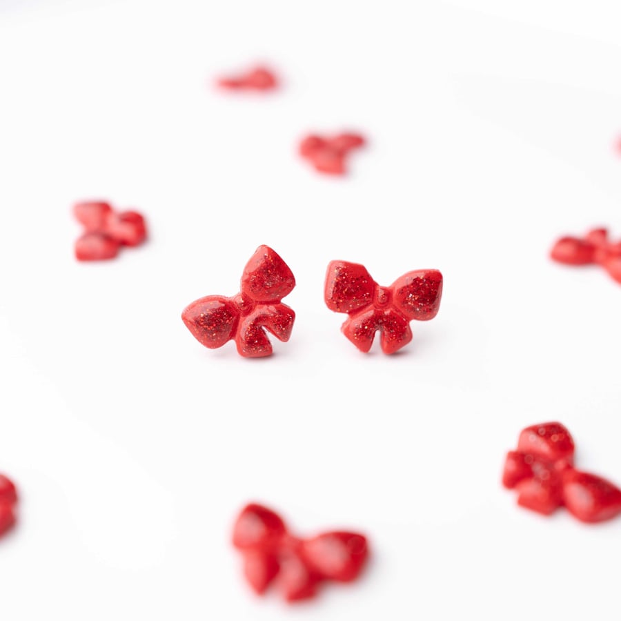 Red Glitter Bow Stud Earrings: Handmade Polymer Clay Christmas Jewelry