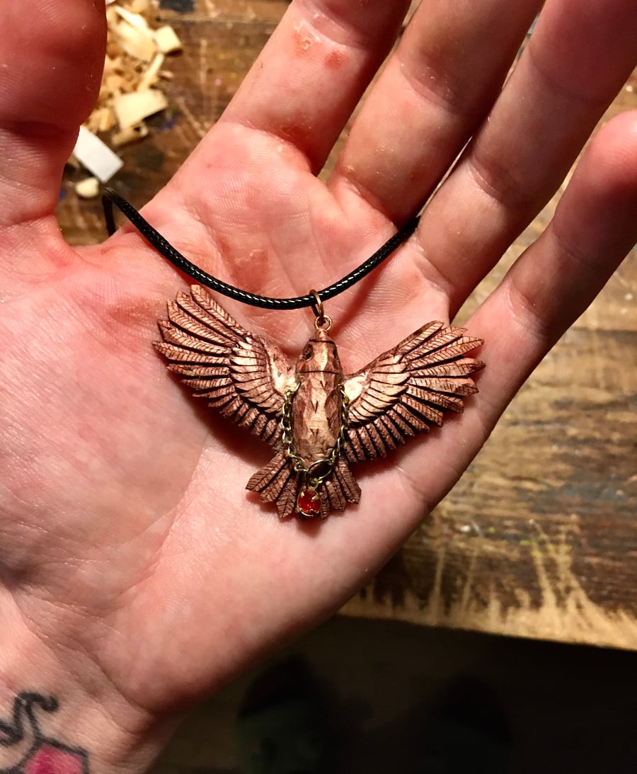 Hand Carved Bird Pendant with Garnet Birthstone