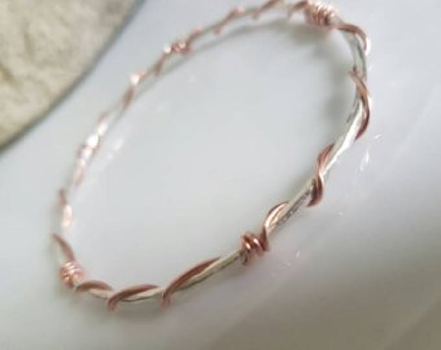 Copper wrap on sterling silver bangle, made to order to get the boho look.