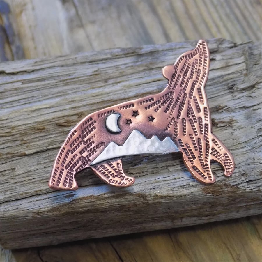 Copper and silver 'mountain bear' mixed metal brooch 