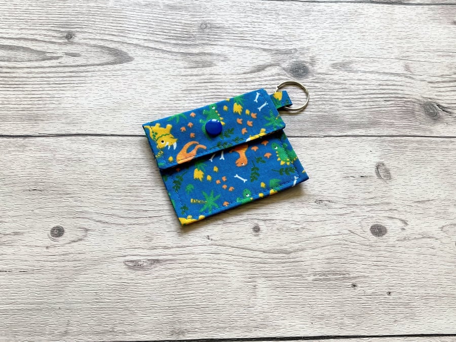 Dinosaurs round tin lip balm blue fabric keyring, keychain. Lipstick holder.