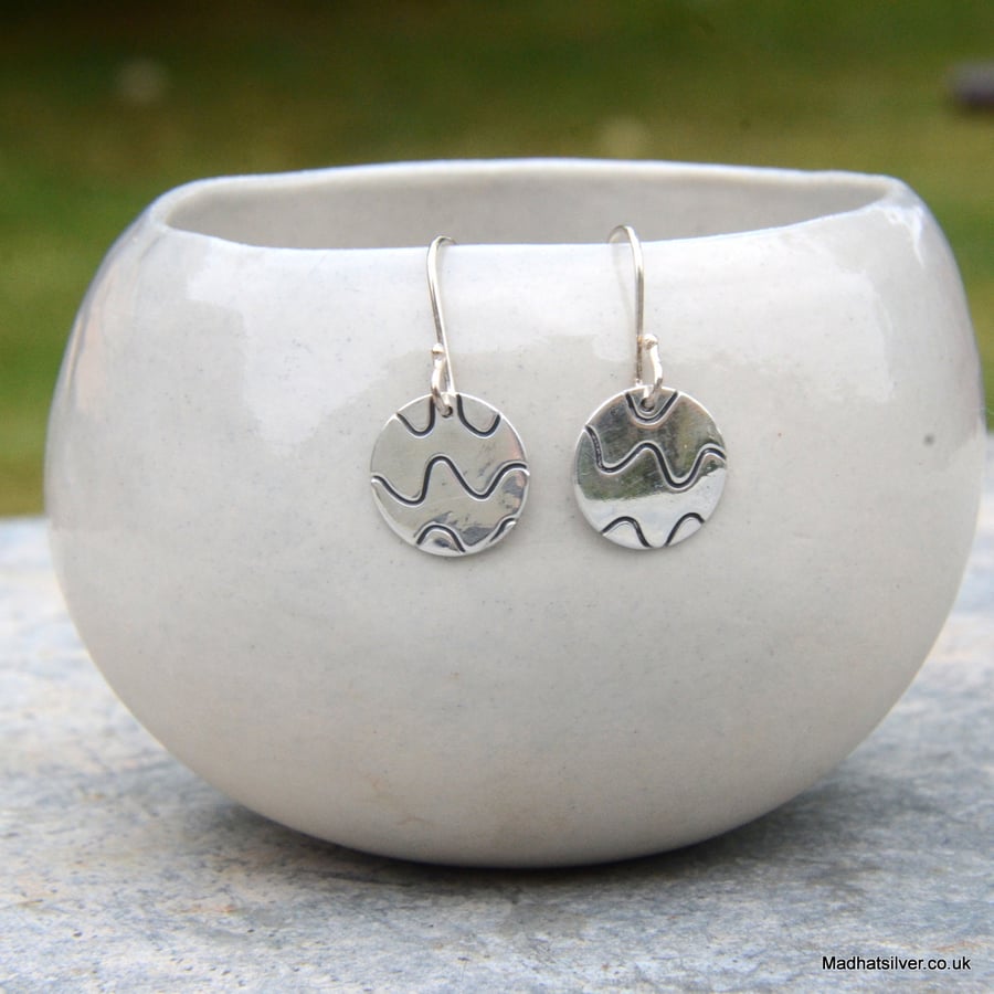 Sterling silver textured disc earrings