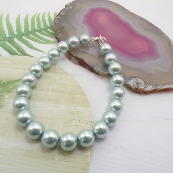 Light Blue Round Pearl beaded Silver Bracelet.