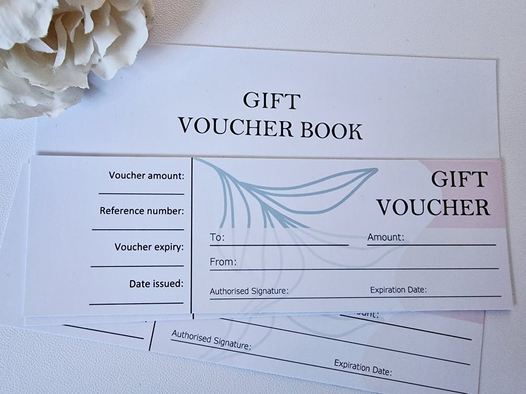 Generic business gift voucher book with 23 vouchers. 12 x 6cm perforated slip