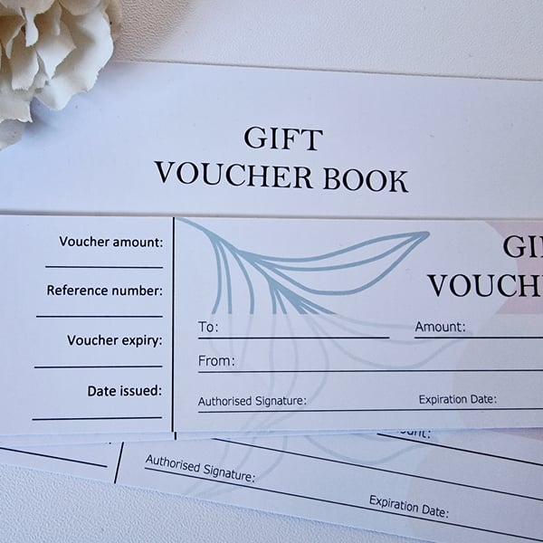 Generic business gift voucher book with 23 vouchers. 12 x 6cm perforated slip