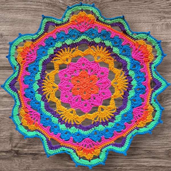 large, bright, crochet doily, mandala table mat
