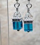 Crystal earrings with silver plated wires, turquoise and clear