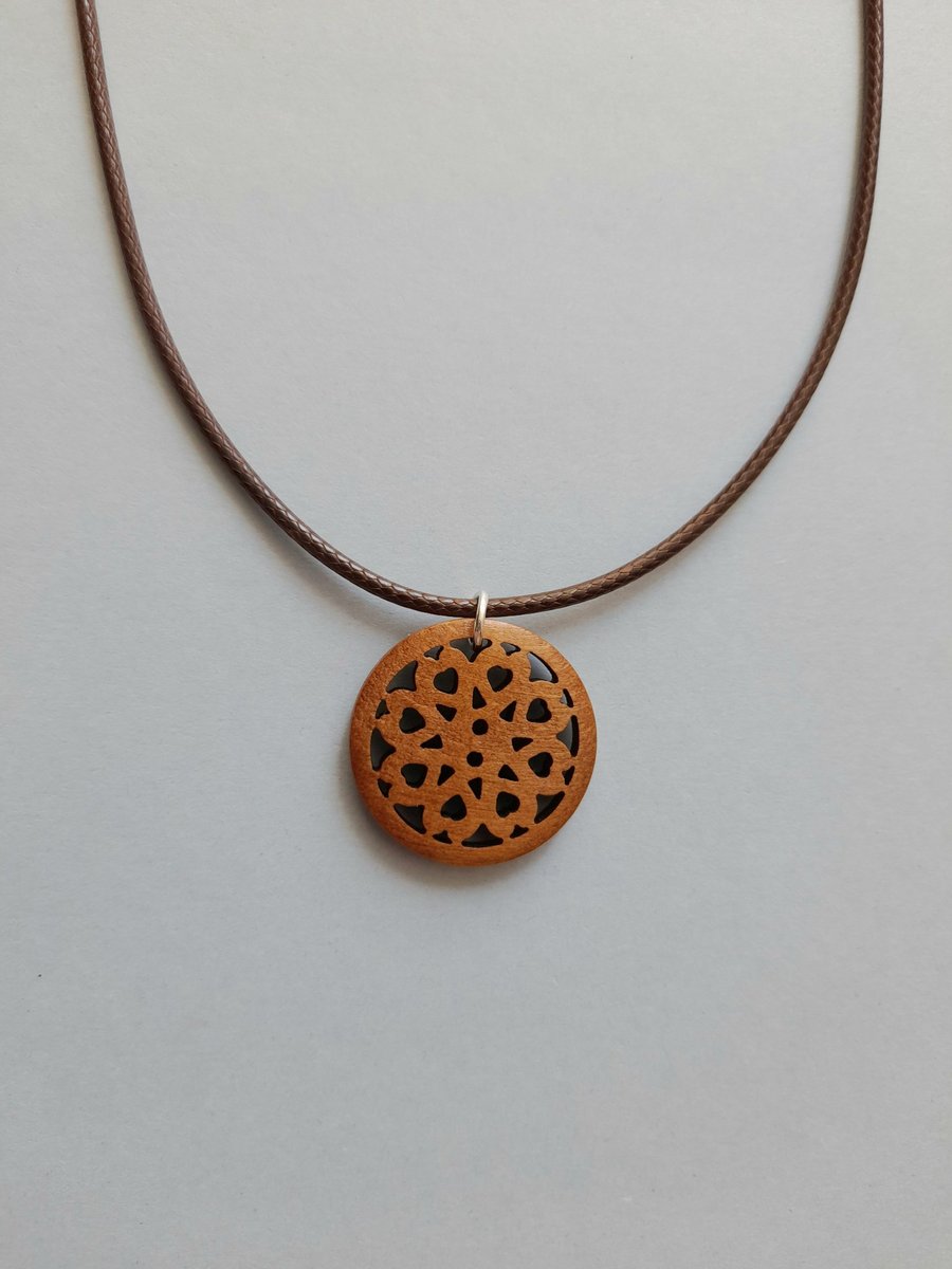 Wooden Rosette Pendant Necklace: Brown Waxed Cord, Adjustable Length.