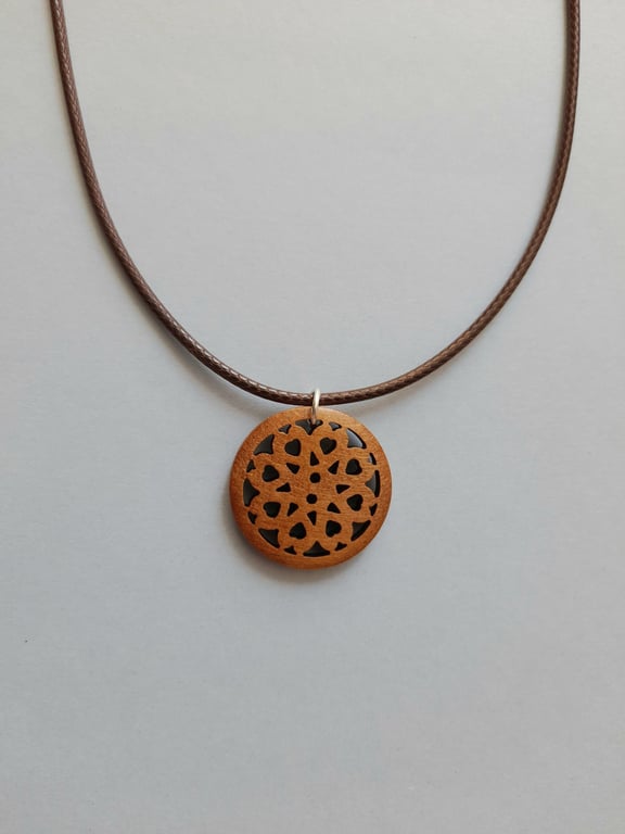 Wooden Rosette Pendant Necklace: Brown Waxed Cord, Adjustable Length.