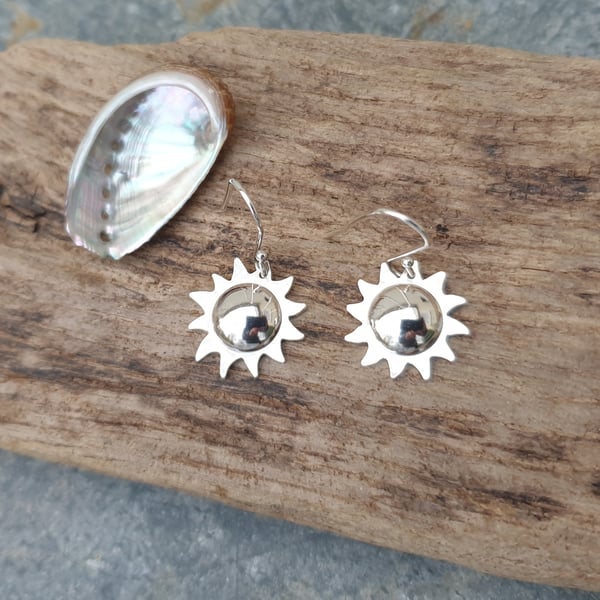Silver sun earrings