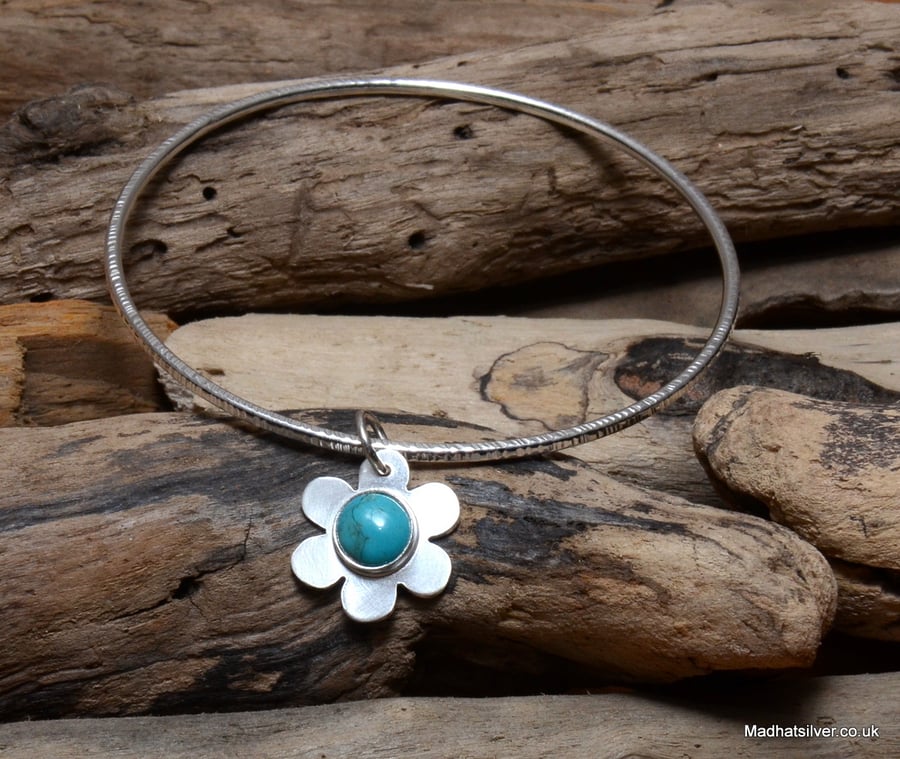 Hammered bangle with silver and turquoise flower